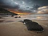 Zonsondergang op het strand bij Arromanches-les-Bains